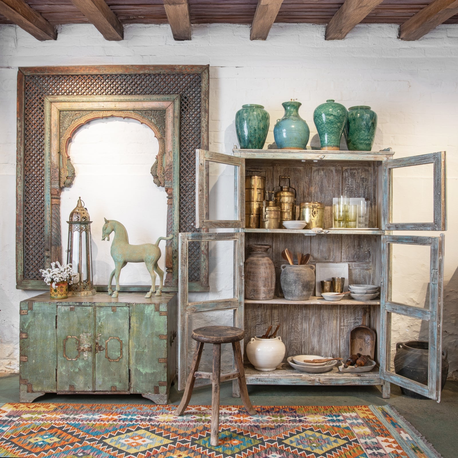 Green painted military chest with reclaimed Rajasthani & Gujarati antique furniture